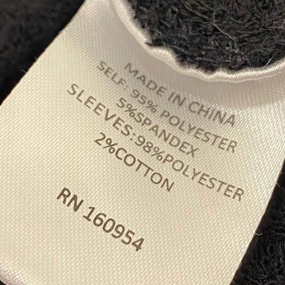 Waffle-knit sweater with floral balloon sleeves and lace detail - Picture 7 of 7